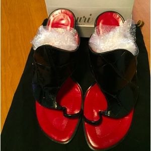 Mauri, Nero Alligator sandals.